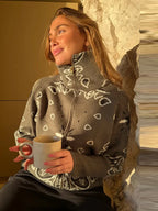 Cárdigan con cremallera y estampado jacquard
