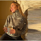 Cárdigan con cremallera y estampado jacquard