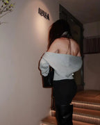Chaleco de punto con cuello alto y espalda descubierta